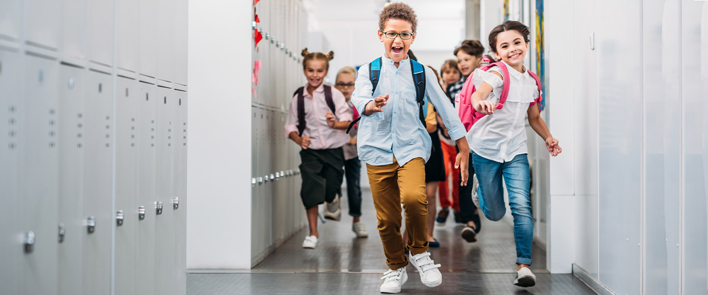 APGFCU Youth Kids Savings kids running in school hallway