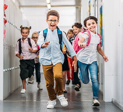 APGFCU Youth Kids Savings kids running in school hallway