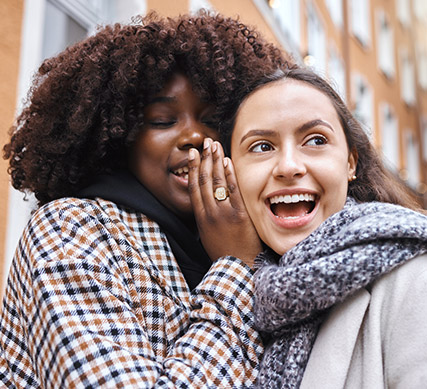 APGFCU Refer A Friend Girls talking to each other